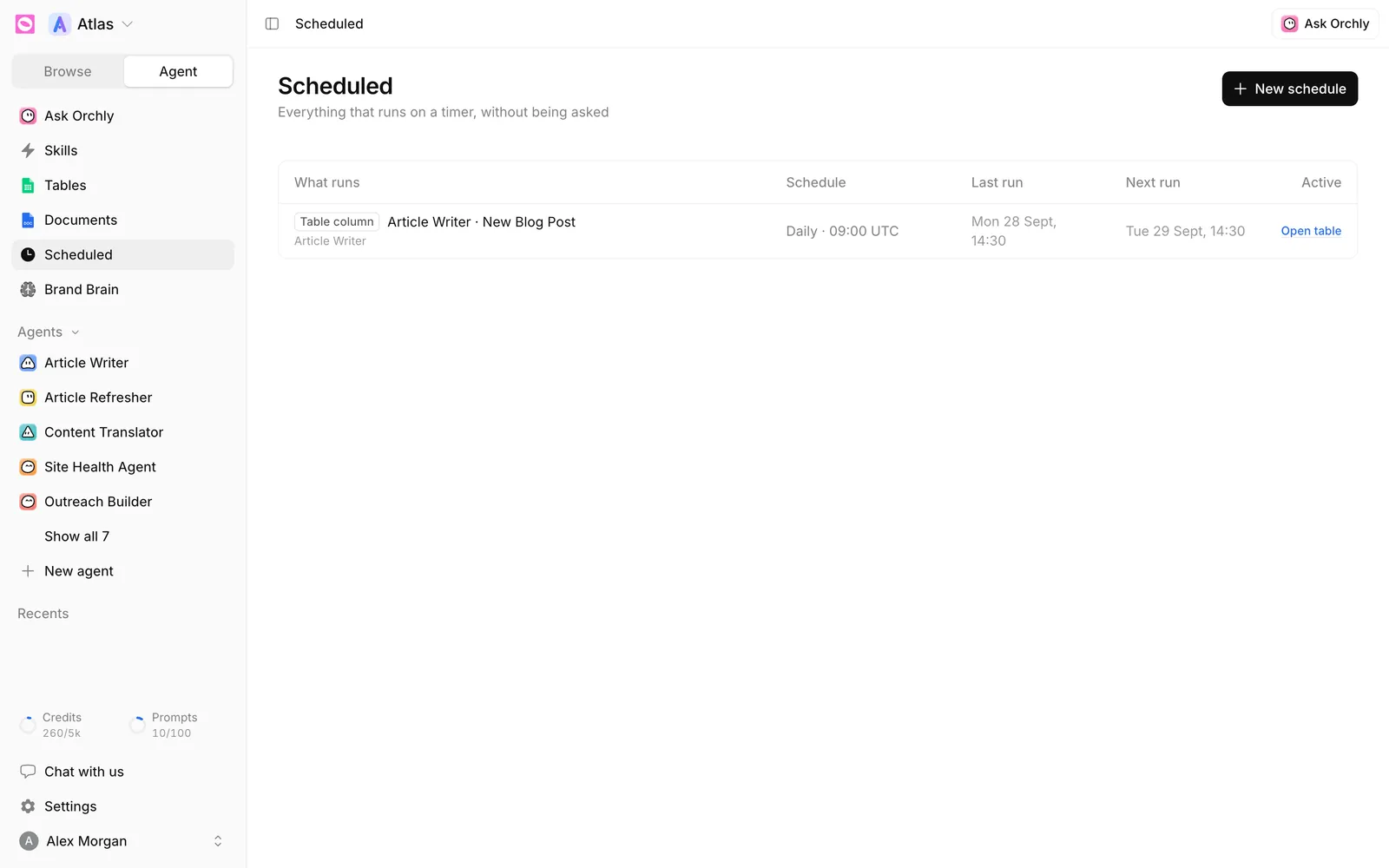 Scheduled page listing an Article Writer table column schedule, daily at 09:00 UTC, with last and next run and an Open table link